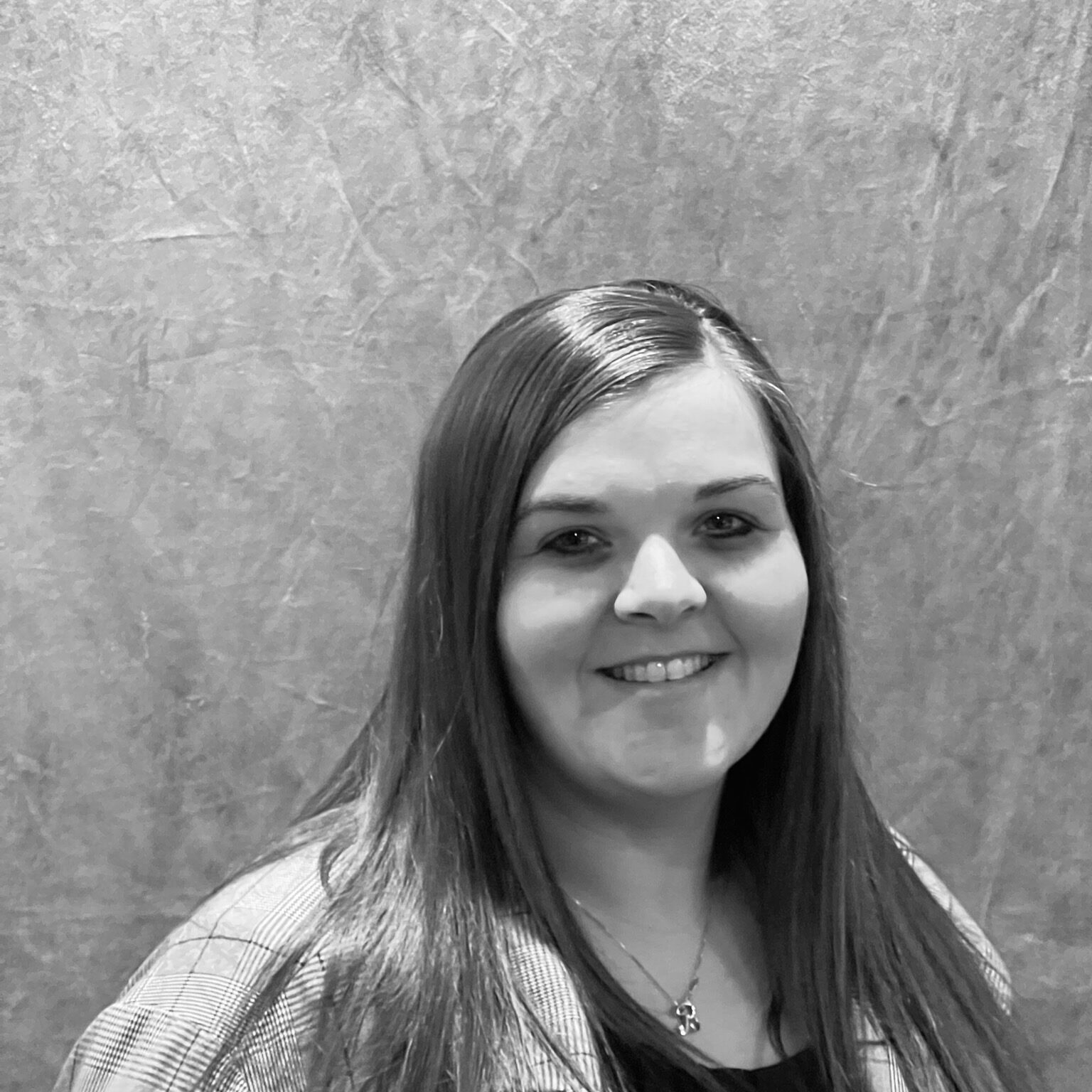 black and white headshot of emily deschepper