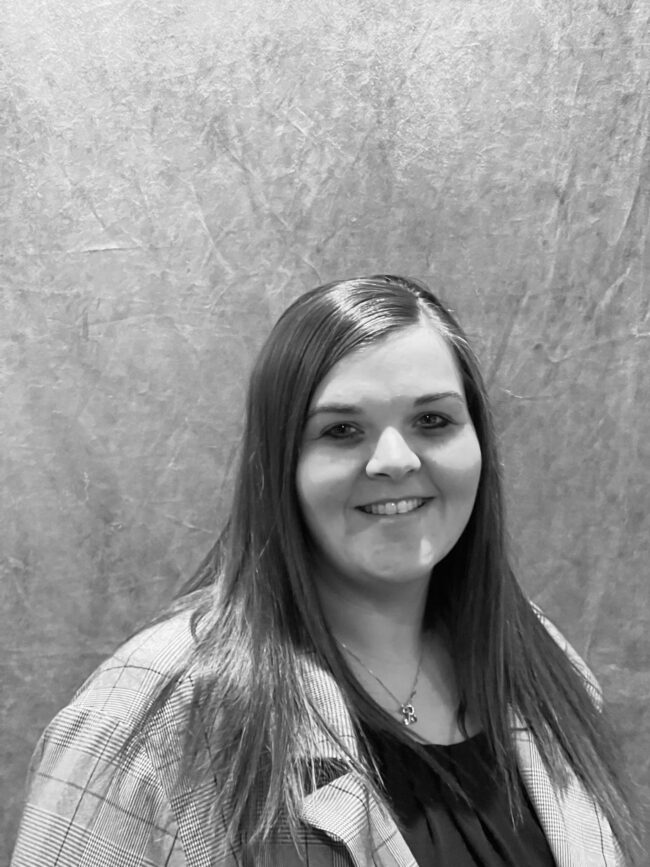 black and white headshot of emily deschepper